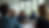 Eye-level view of a classroom with students engaged in group discussion